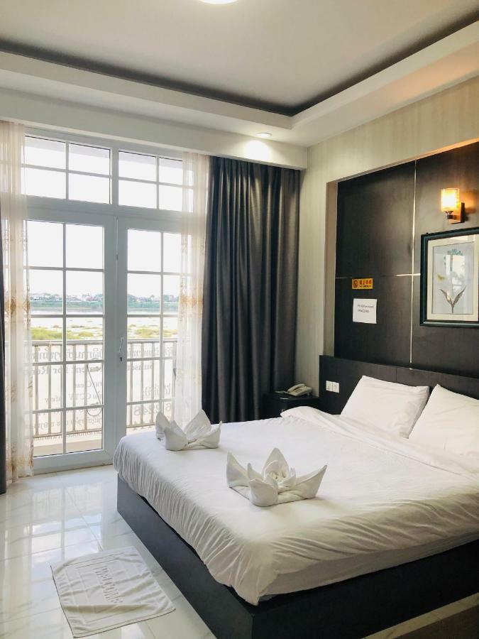 Sunset Mekong Apartment Vientiane Bagian luar foto